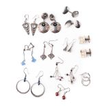 A collection of silver earrings to include in the Art Nouveau style, stone set examples and other