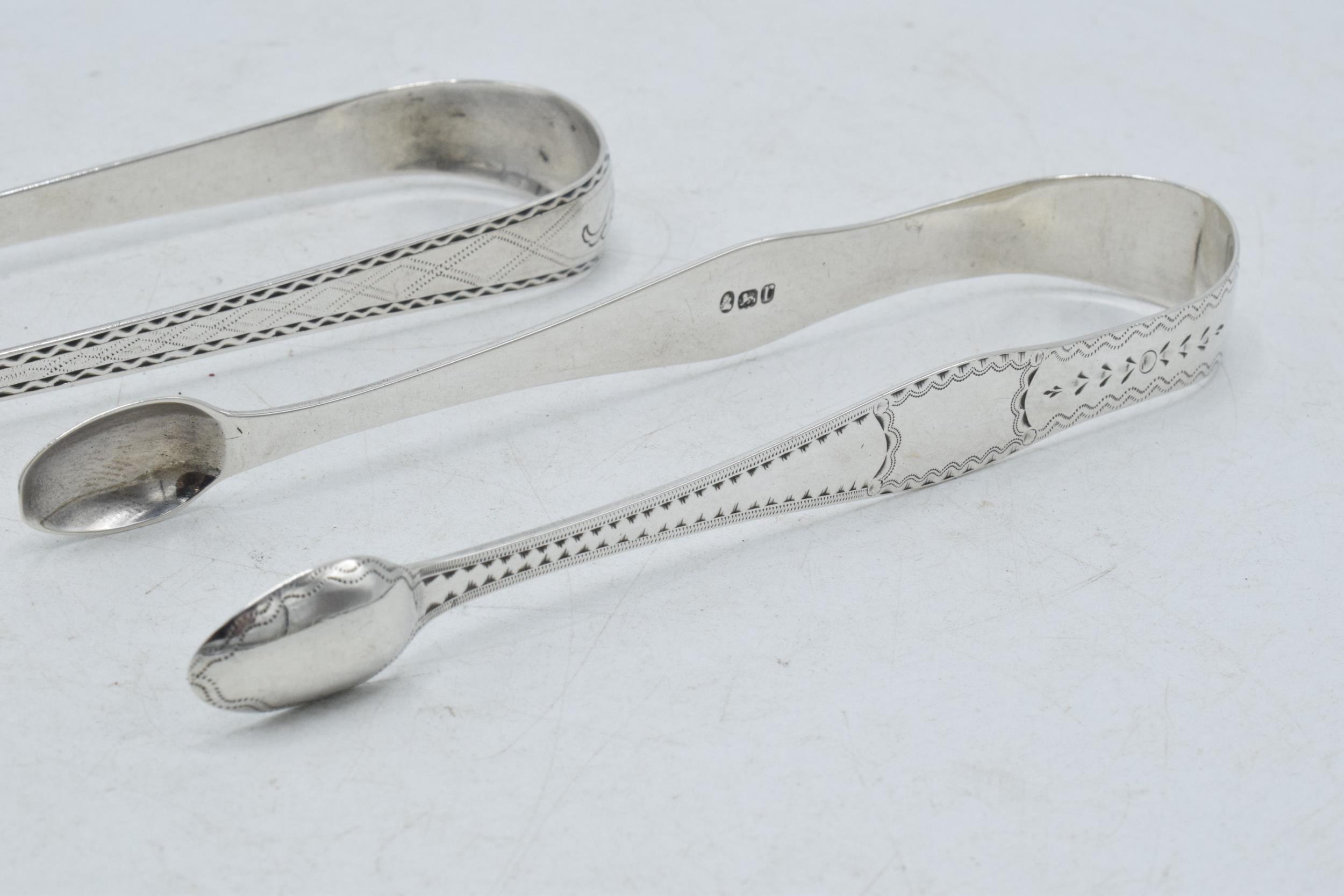 Two pairs of Scottish silver tongs to include a Georgian pair of plain form, Edinburgh 1805, - Image 3 of 6