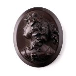 Vulcanite cameo brooch, 5cm tall.