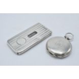 A silver pocket watch case with masonic symbol to front together with a striped silver cigarette