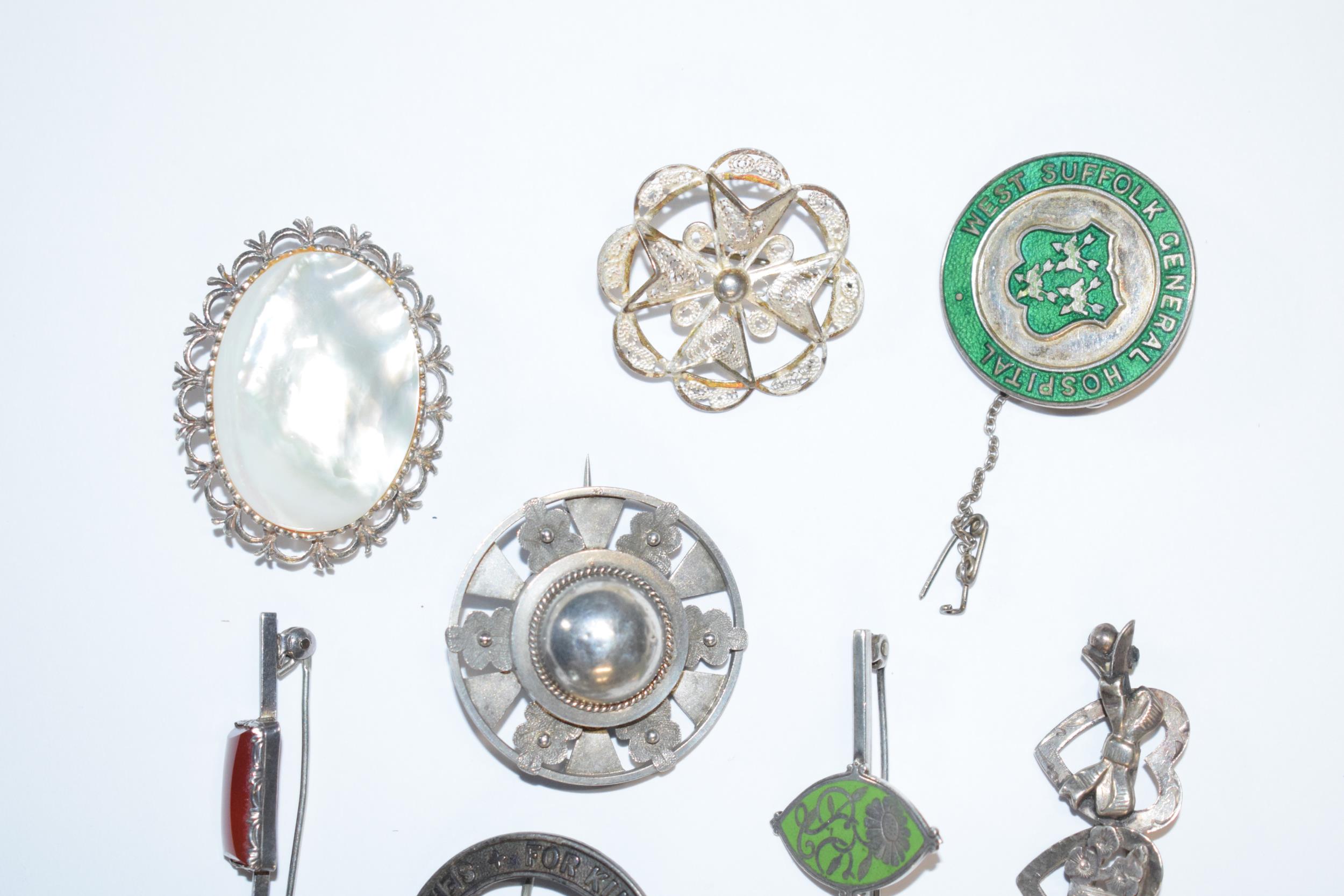 An interesting collection of silver jewellery to include enamelled fobs, Victorian brooches, - Image 3 of 5