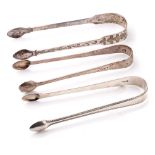 A trio of silver sugar tongs to include 2 Georgian pair and one similar, 102.1 grams (3).