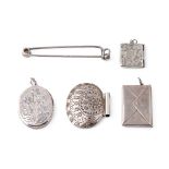 A collection of silver items to include a stamp case, a smaller example, an oval locket, a clip