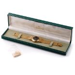 Boxed gold plated Gucci quartz wristwatch, black dial set with diamonds and calendar, model no.