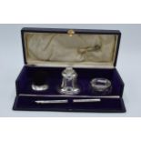 Cased silver writing travelling set to include an inkwell, a brush, a stamp, a roller and an