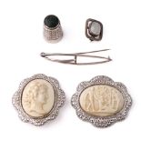 A collection of silver Charles Horner items to include a thimble, an Art Nouveau brooch and one