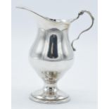 Silver pedestal jug, Birmingham 1972, 107.7 grams, 13cm tall.