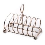 Victorian silver arched 6-space toast rack, Edinburgh 1877, 318.4 grams, 17cm long.