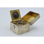 Silver travelling inkwell in cube form, Birmingham 1909, GY & Co, with glass liner, 5cm tall. Slight