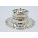 Silver circular inkwell with glass liner and holes for pen rests, London 1915, Goldsmiths and