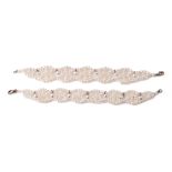 A pair of silver mounted pearl bracelets, 19.5cm long (2).