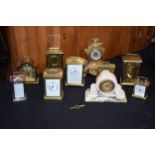 A collection of carriage and mantle clocks to include a quality brass cased carriage clock with