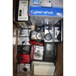 A collection of cameras to include makes such as Sony and Fujifilm together with a Nintendo DS and a