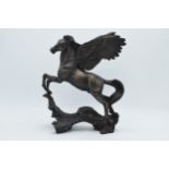 Bronze effect resin figure of Pegasus BO2, with indistinct signature to base, 28cm tall.