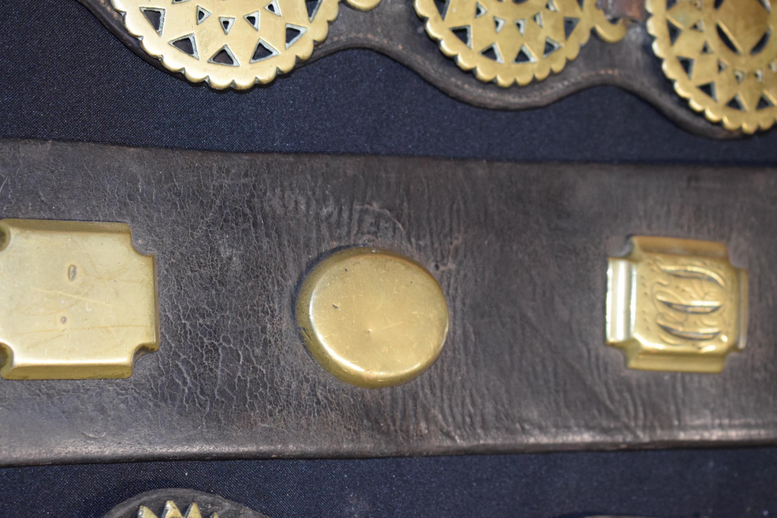 A collection of antique and later horse brasses to include some mounted on leather, longest 110cm ( - Image 6 of 6