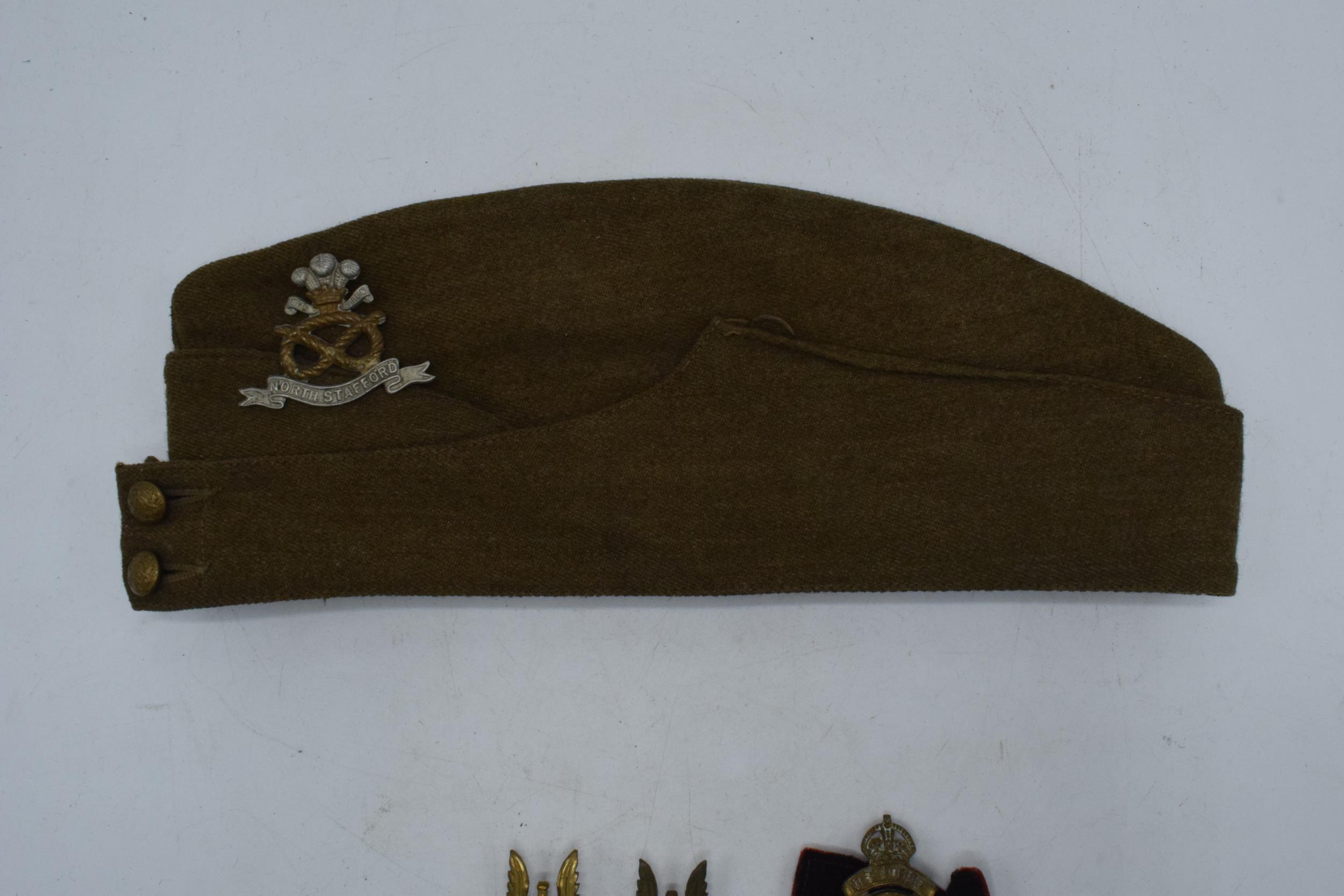 A Staffordshire regiment military cap. Two SAS regiment cap badges and a Royal Artillery Cap - Image 3 of 4