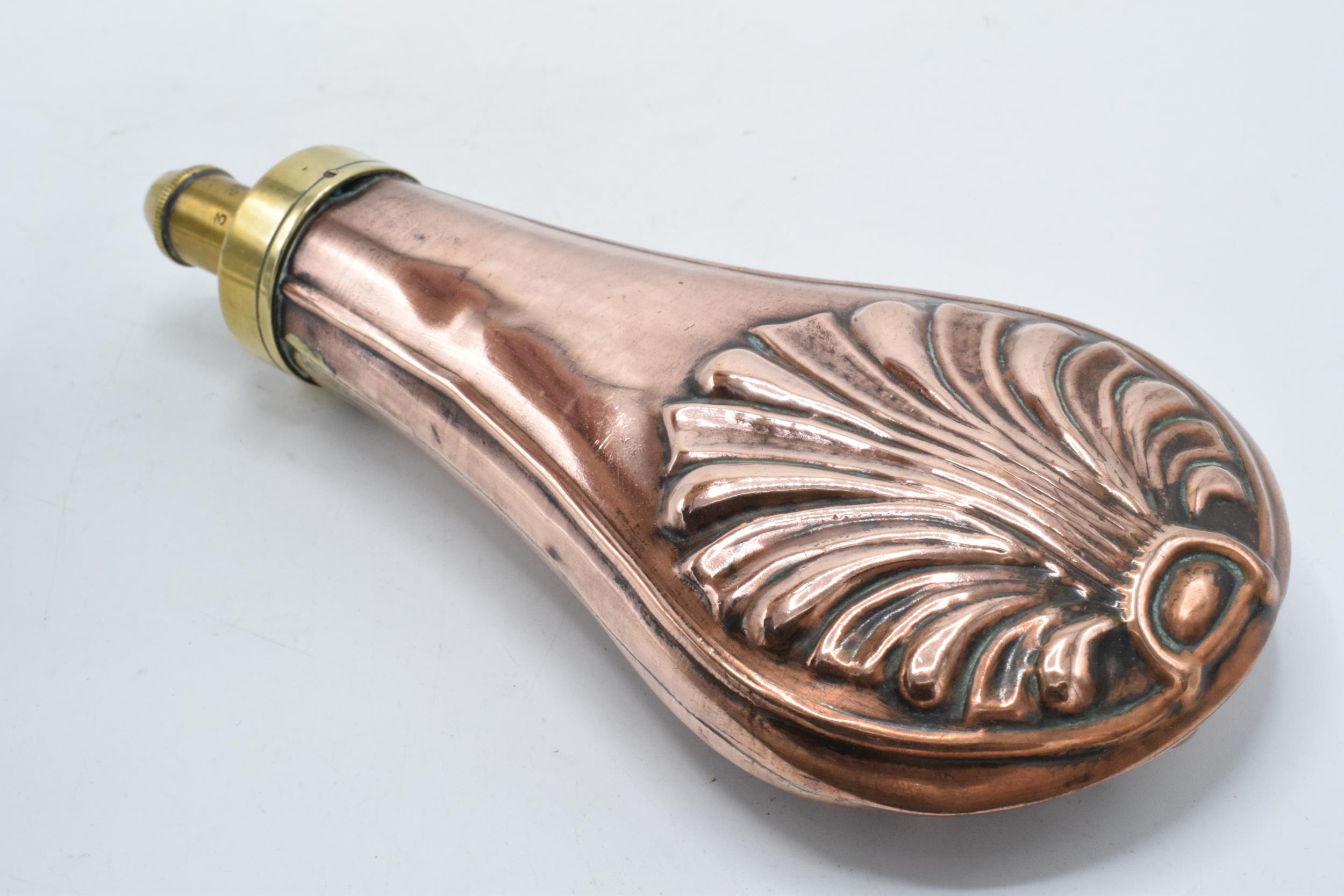 19th century copper and brass powder flask with repousse decoration with gauge to lid, 20cm long. - Image 3 of 6