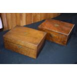 A pair of 19th century wooden writing slopes with brass escutcheons (2).