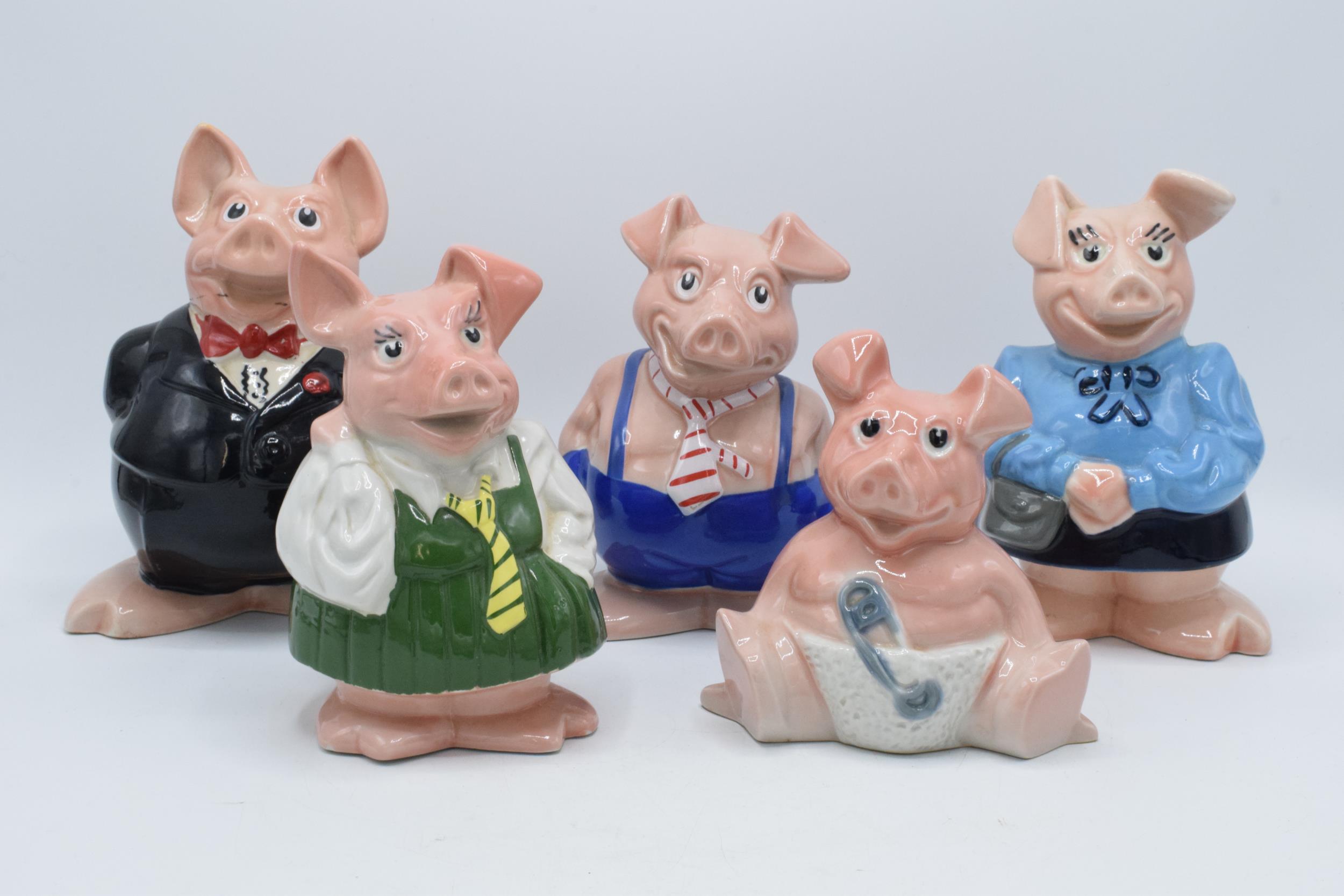 A collection of Wade Natwest pig money banks (5), all with stoppers. In good condition with no