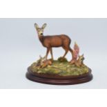 Border Fine Arts figure In A Sunny Glade, signed by Ray Ayres, 21cm wide. In good condition with