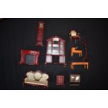 A collection of dolls house furniture to include living room and hall furniture (10).
