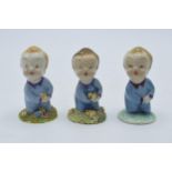 A trio of Wade Wynken figures, 1950s, with 2 having moulded floral base and one plain, 7cm tall (3 -
