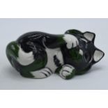 Lorna Bailey Cat lying down in black and green in a playful state. In good condition with no obvious