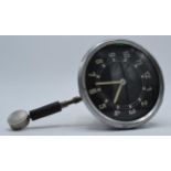 Pre WWII car clock by JSGUS. Winds and ticks with 8 day movement. Diameter 8.5cm. Winds and ticks.