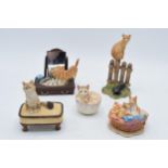A collection of Border Fine Arts cat figures to include a Cat on a Dressing Table, Cats in a Laundry