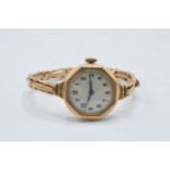 9ct gold cased ladies wristwatch with 9ct gold bracelet, gross weight 18.0 grams.