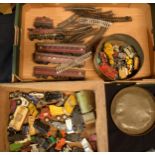 A collection of vintage toys to include Matchbox and Corgi cars. Tri-ang trains and track. In play-