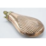 19th century copper and brass powder flask with ribbed decoration, 17cm long.