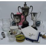 A mixed collection of golfing related items. To include trophies, glass and china and other items.