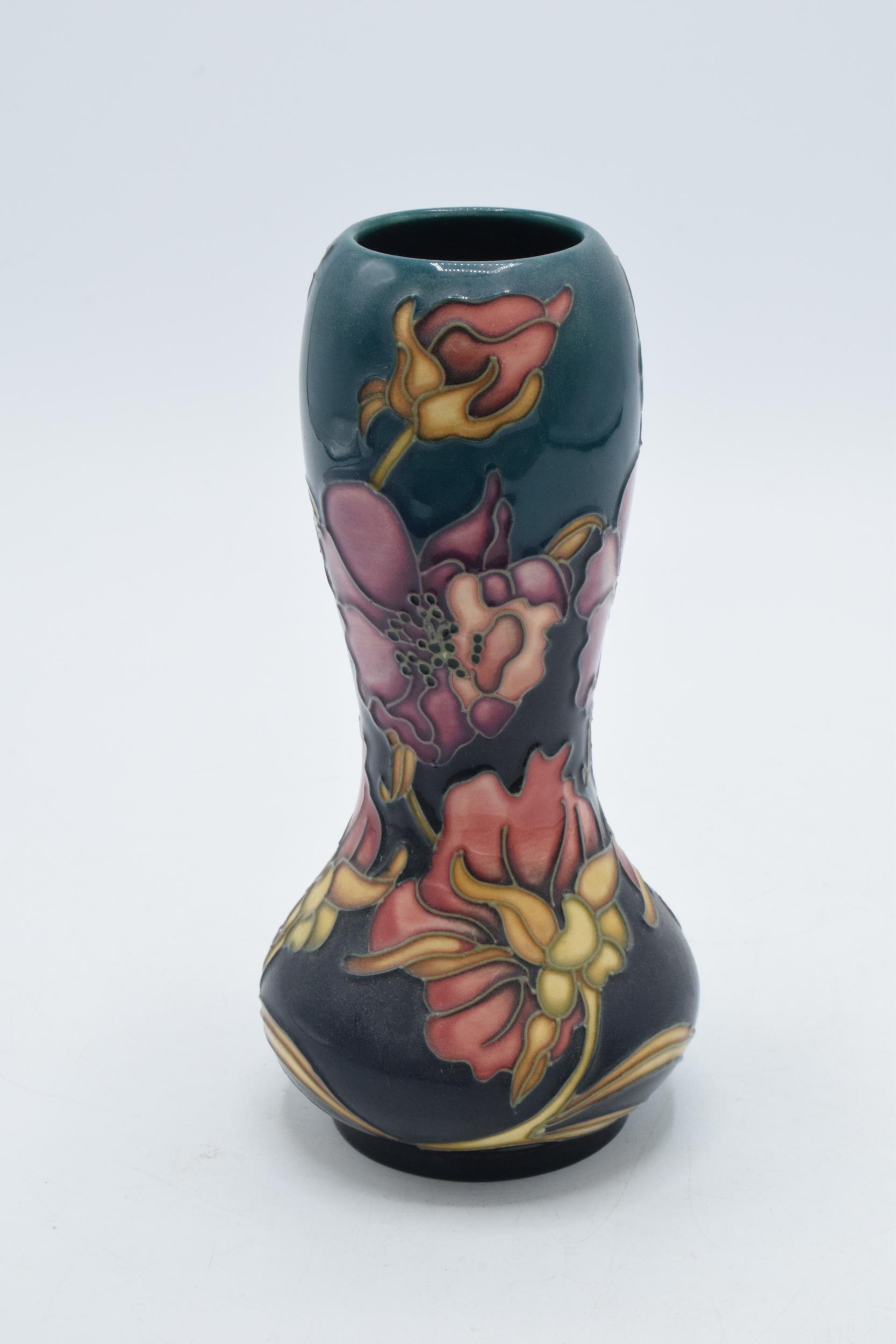 Moorcroft low shouldered gourd vase with floral patterns on blue background, 16cm tall, red dot - Image 2 of 3