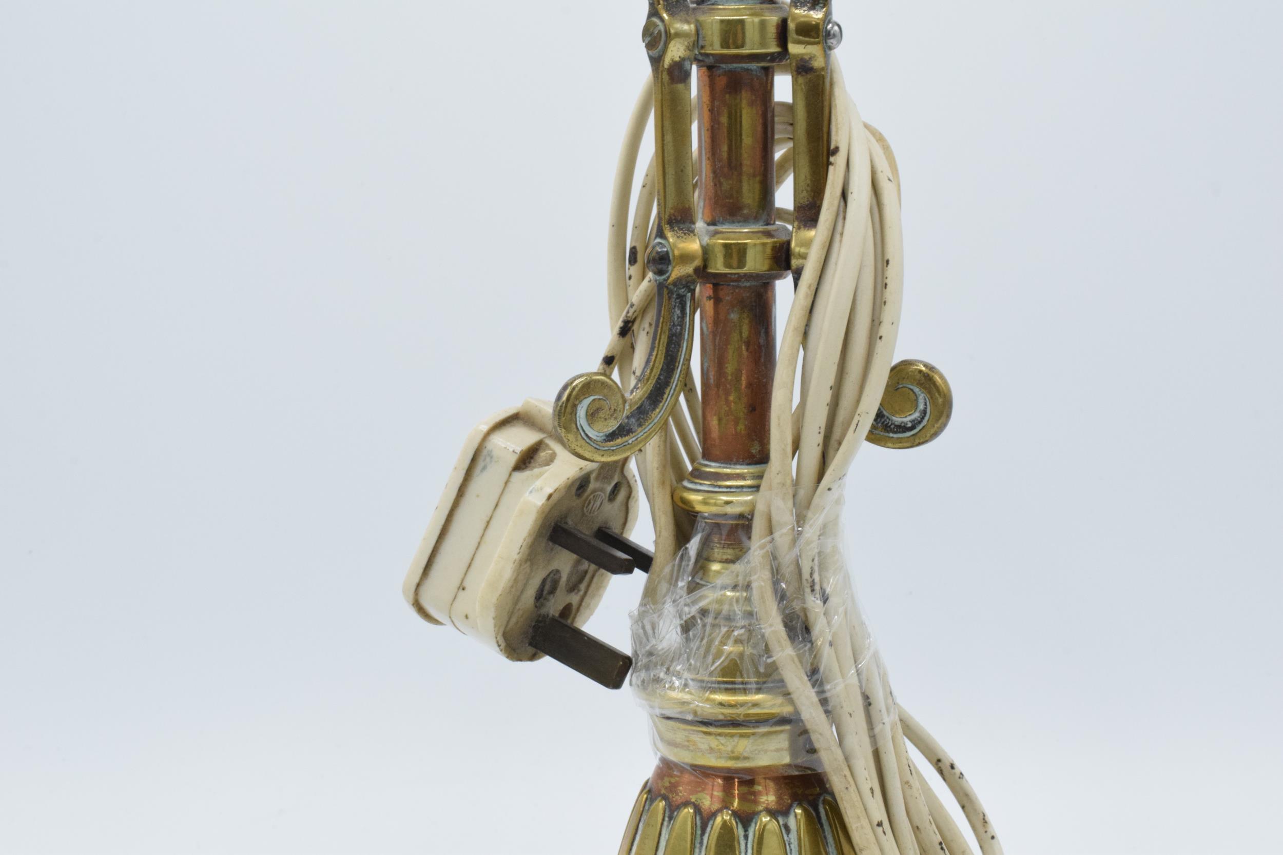 Early 20th century heavy cast brass and metal lamp base mounted onto heavy metal base, 34cm tall, - Image 3 of 4