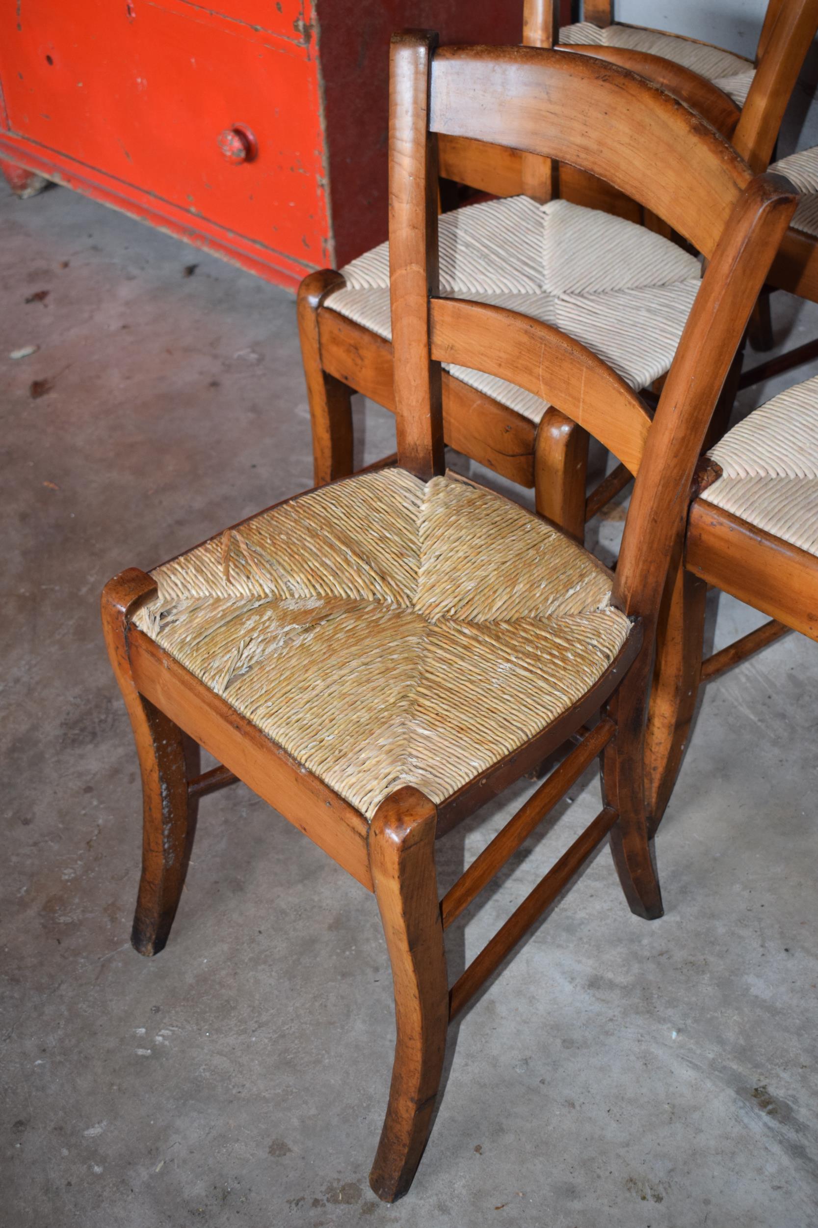 A set of 6 late 19th century elm (or similar) rush stead dining chairs, 82cm tall (6). In good - Image 3 of 7