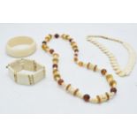 A collection of vintage bone jewellery to include a necklace, one similar and two bracelets (4).