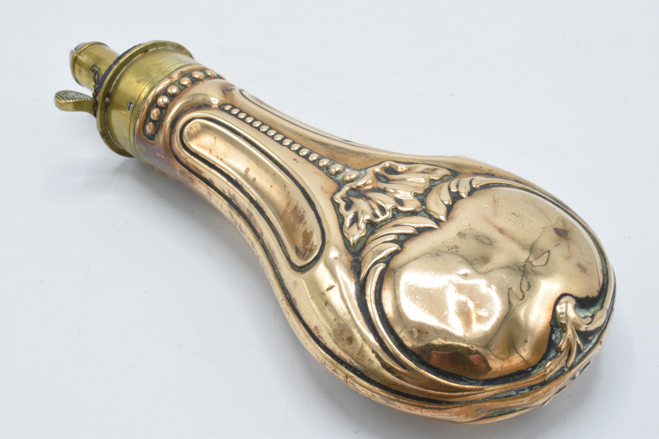 19th century copper and brass powder flask with repousse decoration by James Dixon & Sons Sheffield,