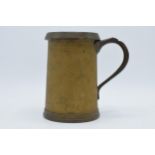 Antique heavy brass and similar metal tankard with shaped handle and marks to top rim, 'Quart'