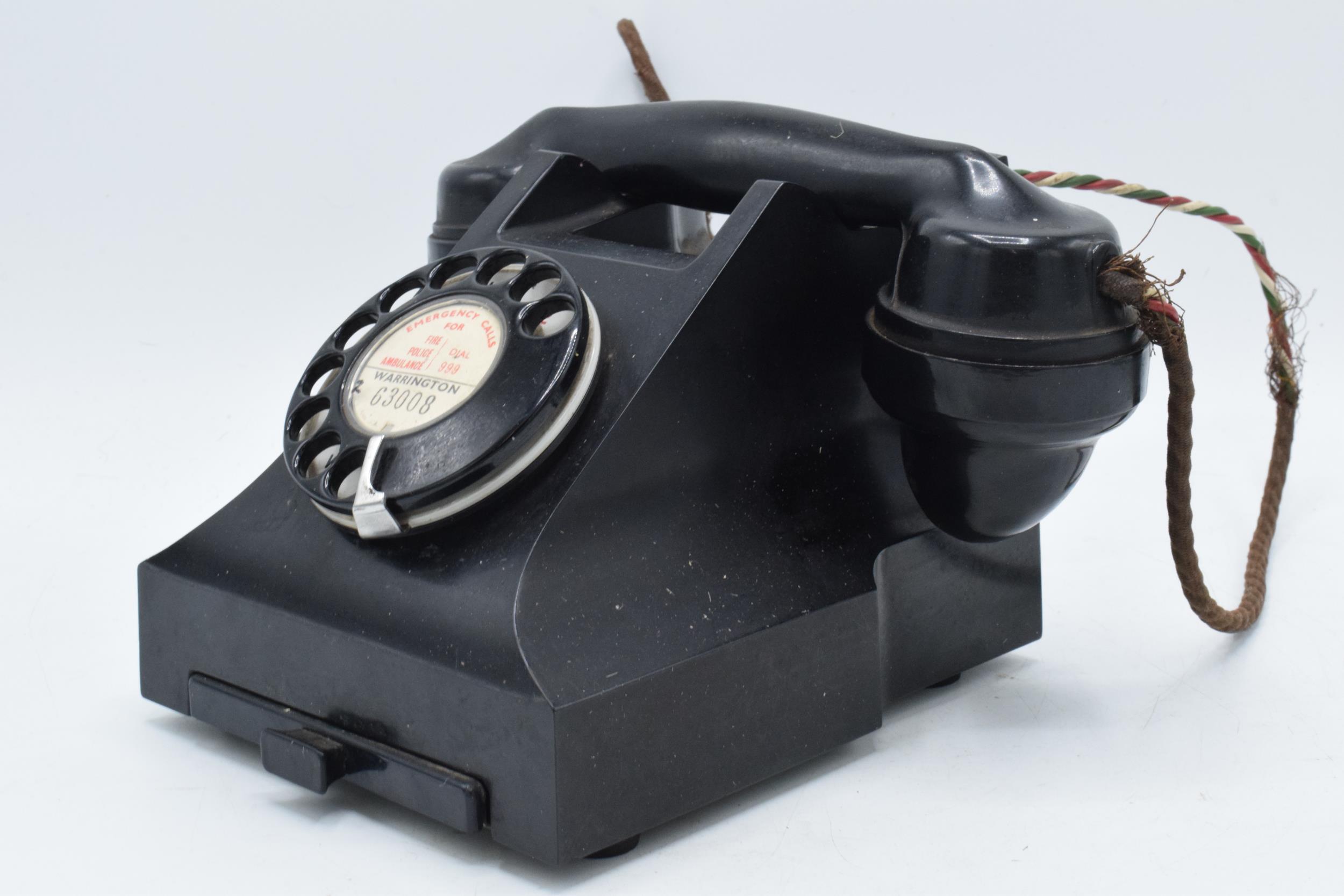Vintage bakelite telephone and base 'Warrington', with wire. Sold as decorative. - Image 3 of 3
