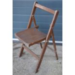 A collection of 21 early to mid 20th century folding wooden chapel chairs (21). In good functional