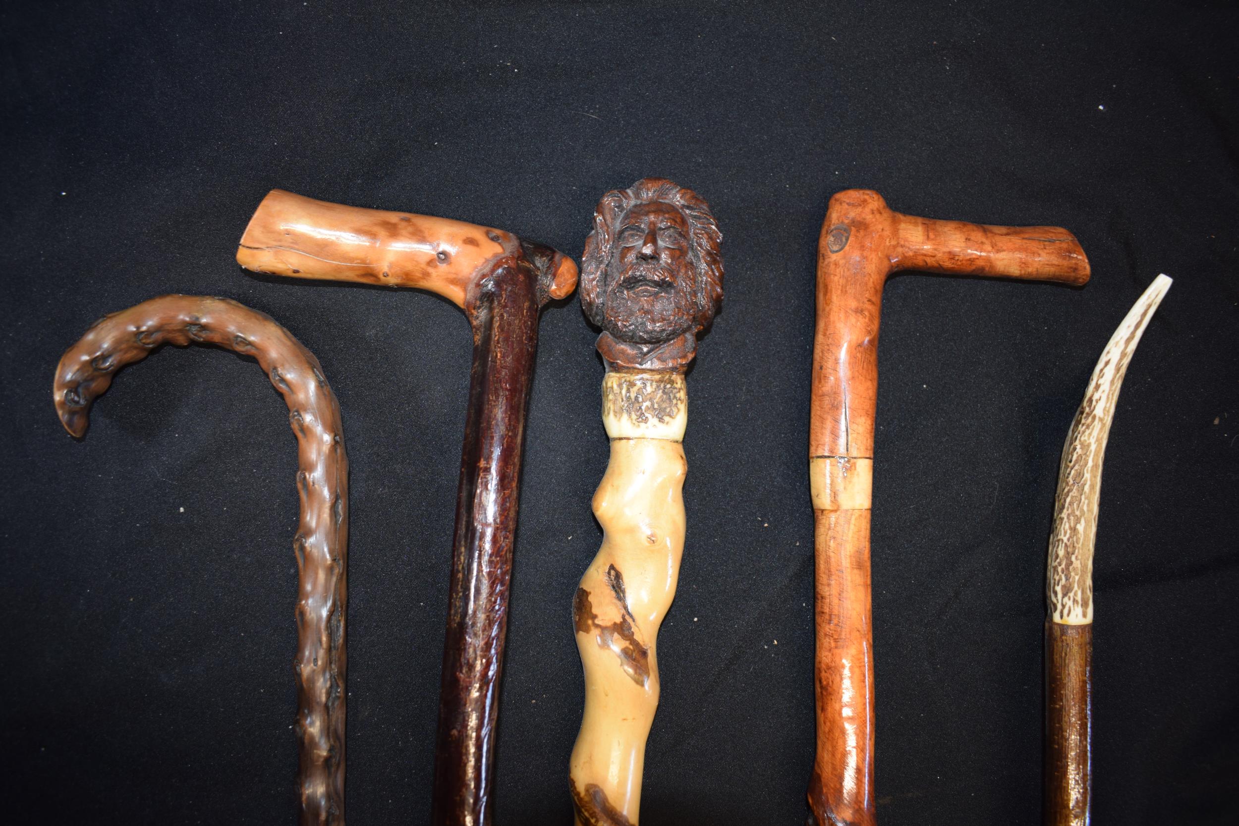 A collection of vintage walking sticks, one with handle in the form of a head, together with 4 - Image 2 of 5