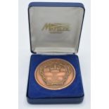 Cased 1986 Commonwealth Games bronze participation medallion.