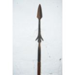 19th century wooden and barbed iron African fishing spear, 106cm long.