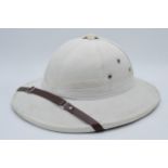 Reproduction pith helmet.