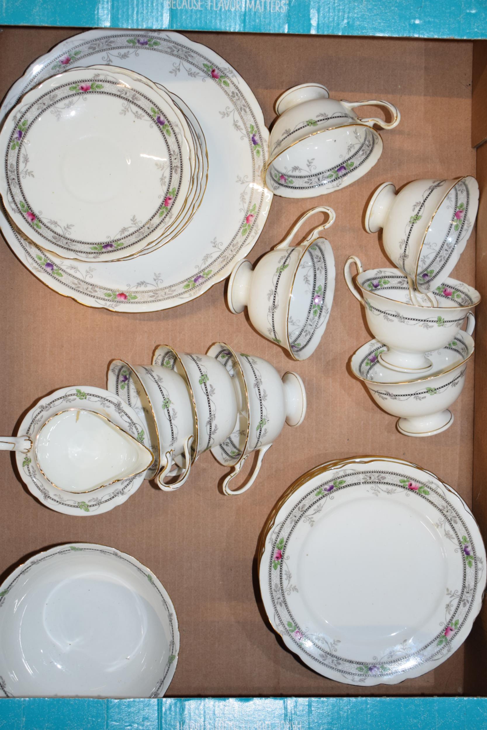 Shelley tea ware in the Rose and Bead pattern 10775 to include 8 trios, 4 spare side plates and