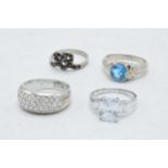 A collection of 4 silver dress rings (4).