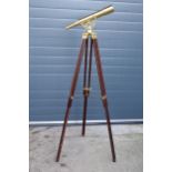 Late 20th century brass telescope on wooden extending base, unnamed, 164cm tall when extended. In