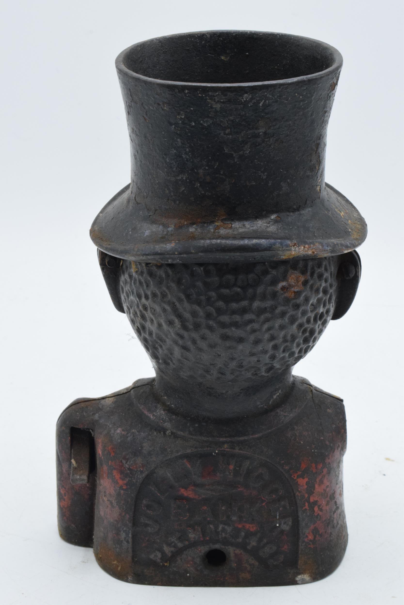 Cast metal jolly man money box with marks to ear, missing arm, 21cm tall. - Image 2 of 4