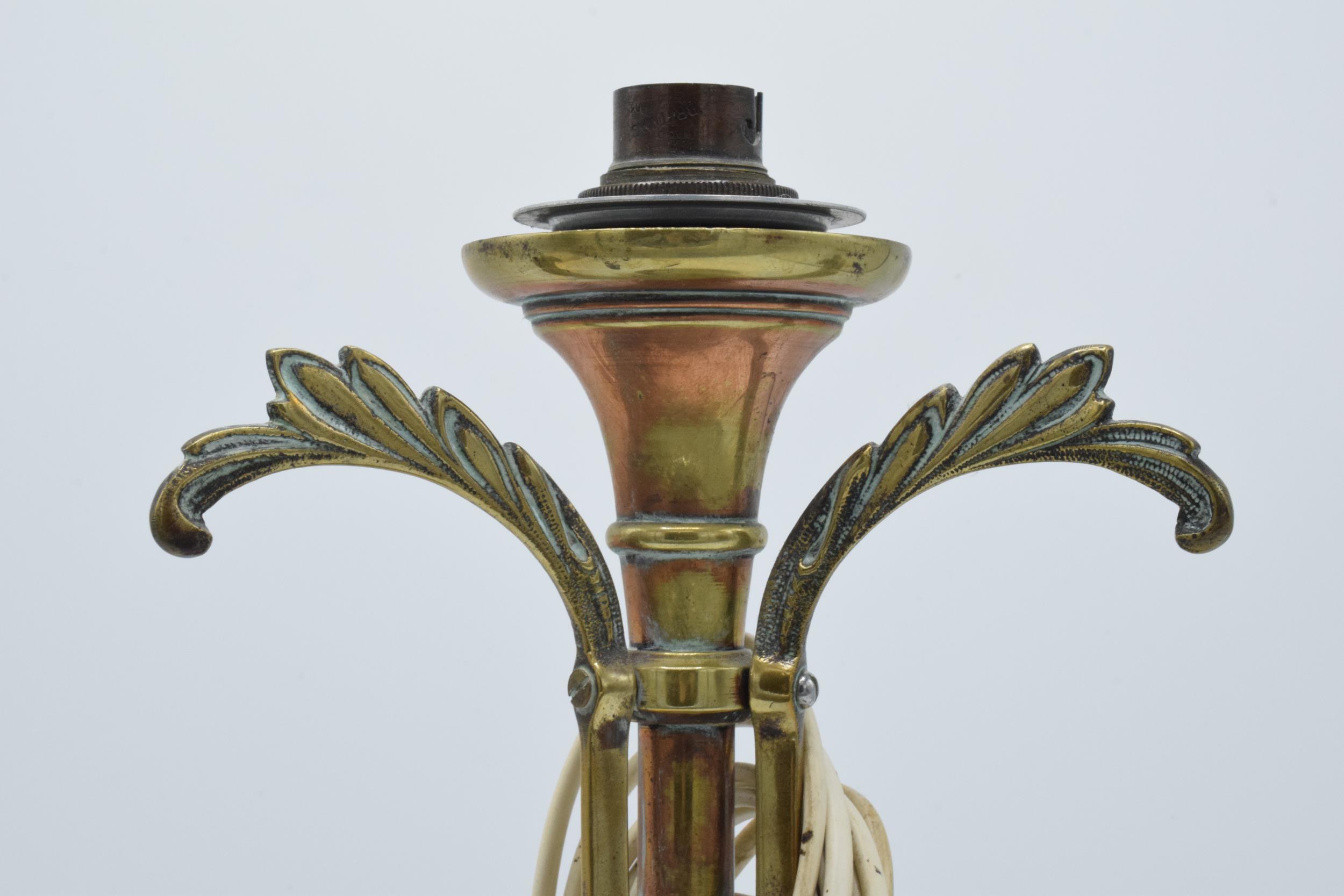 Early 20th century heavy cast brass and metal lamp base mounted onto heavy metal base, 34cm tall, - Image 2 of 4